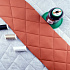 Ultrasonically quilted faux leather, light orange color 1.45 m x 0.2 m