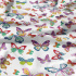 Cotton fabrics, by the meter. Colorful butterflies on white